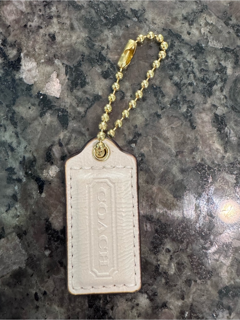 Coach White leather hang tag 2”
